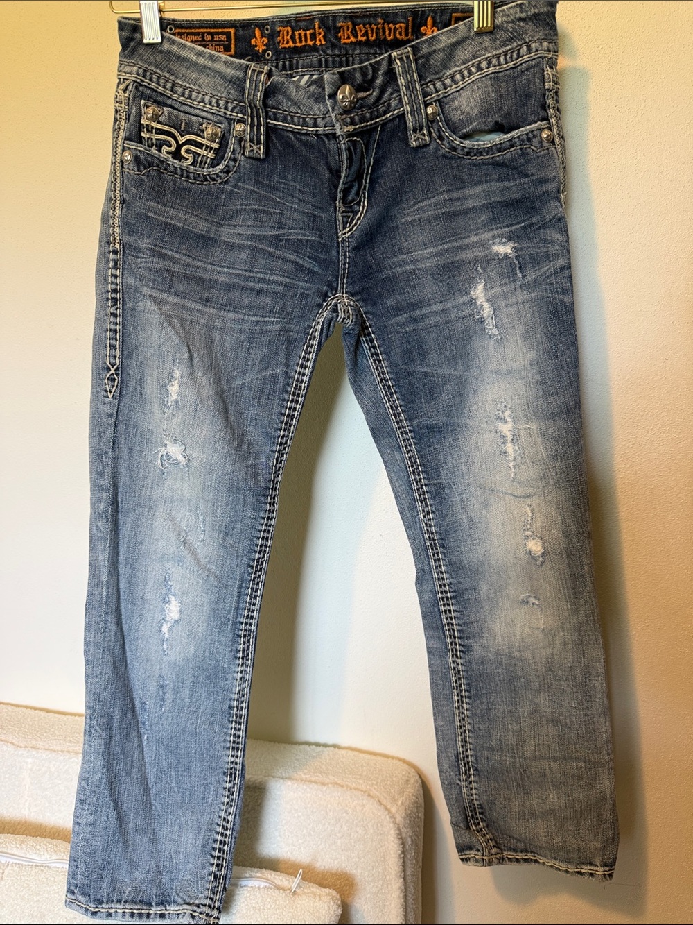 Rock Revival faded blue distressed jeans
